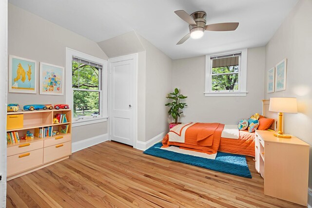 4416 Seeley Ave, Downers Grove, IL 60515 - bedroom with light wood-style floors, ceiling fan, and vaulted ceiling