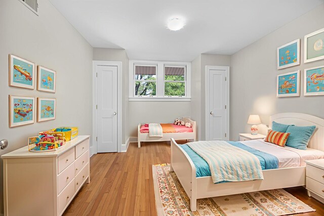 4416 Seeley Ave, Downers Grove, IL 60515 - bedroom featuring light wood finished floors and baseboards