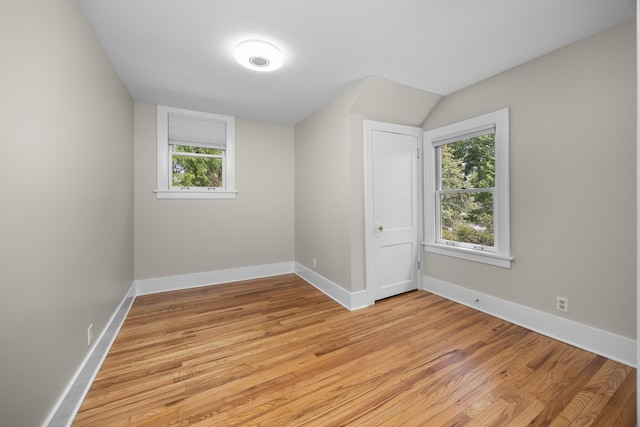 4416 Seeley Ave, Downers Grove, IL 60515 - unfurnished bedroom with light wood-style flooring and baseboards
