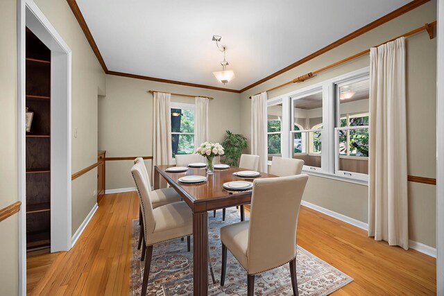 4416 Seeley Ave, Downers Grove, IL 60515 - dining area featuring crown molding and light wood-type flooring