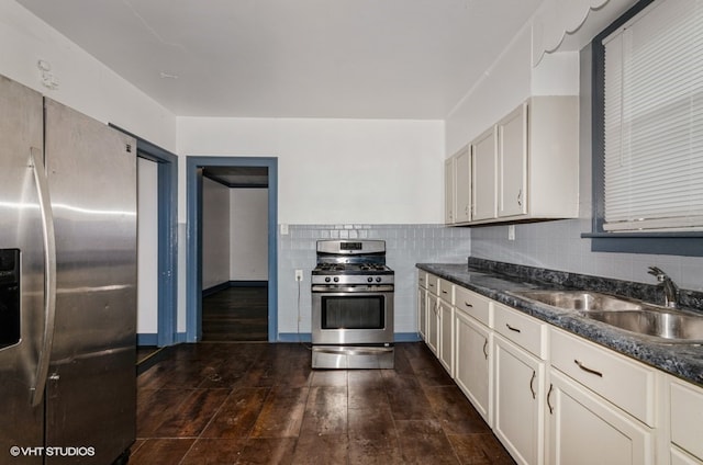 1326 Shields Ave, Chicago Heights, IL 60411 - kitchen featuring appliances with stainless steel finishes, dark wood finished floors, and backsplash