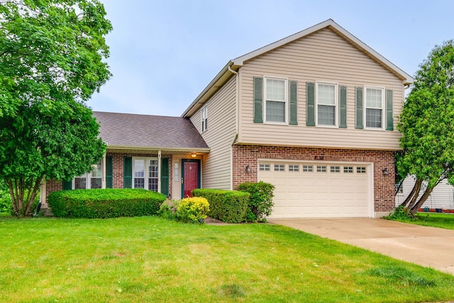 4900 Dukesberry Ln, Hoffman Estates, IL 60010 - view of front of home featuring an attached garage, concrete driveway, a front yard, and brick siding