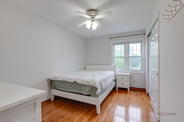 4900 Dukesberry Ln, Hoffman Estates, IL 60010 - bedroom featuring light wood finished floors, a closet, and a ceiling fan