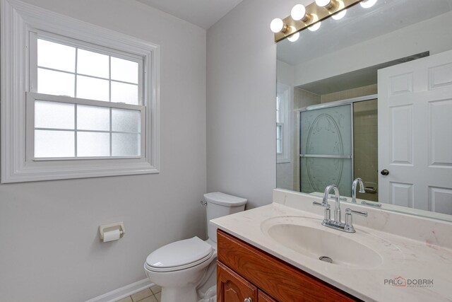 4900 Dukesberry Ln, Hoffman Estates, IL 60010 - full bathroom with vanity, a shower stall, and tile patterned flooring