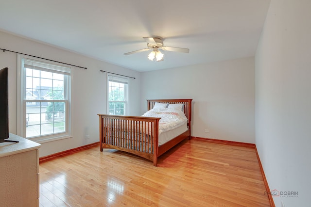 4900 Dukesberry Ln, Hoffman Estates, IL 60010 - bedroom featuring light wood finished floors and a ceiling fan