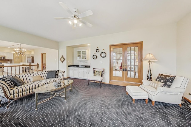 7830 W 157th St, Orland Park, IL 60462 - living area featuring french doors, dark colored carpet, a chandelier, and ceiling fan
