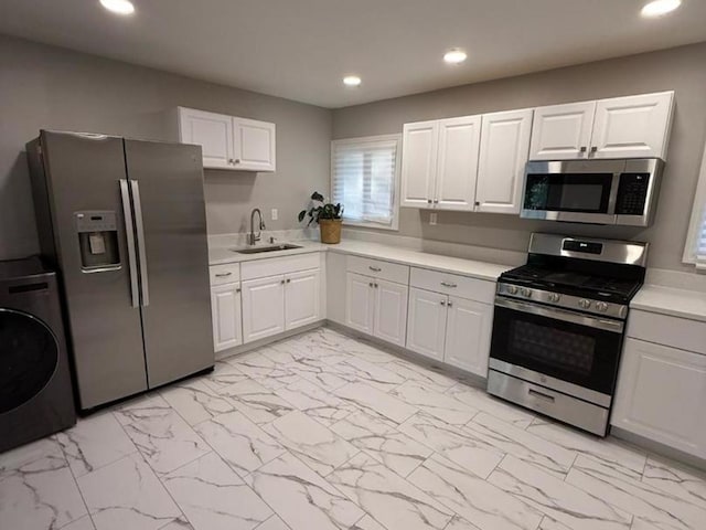 2017 E Sauk Trl, Sauk Village, IL 60411 - kitchen featuring stainless steel appliances, light marble finish flooring, light countertops, recessed lighting, and white cabinetry