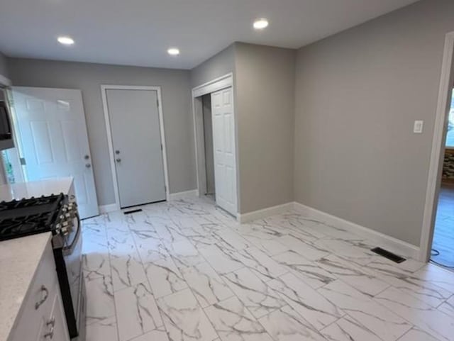 2017 E Sauk Trl, Sauk Village, IL 60411 - unfurnished bedroom featuring light marble finish flooring and recessed lighting