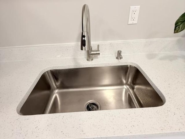 2017 E Sauk Trl, Sauk Village, IL 60411 - kitchen view of a sink and light stone counters