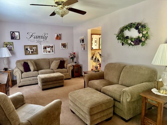 241 E Porter St, Oglesby, IL 61348 - living room with ceiling fan and light colored carpet