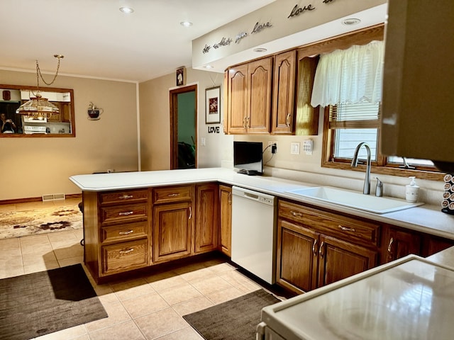 241 E Porter St, Oglesby, IL 61348 - kitchen with dishwasher, light tile patterned floors, a peninsula, light countertops, and recessed lighting