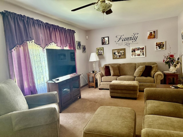 241 E Porter St, Oglesby, IL 61348 - living area featuring light colored carpet and a ceiling fan