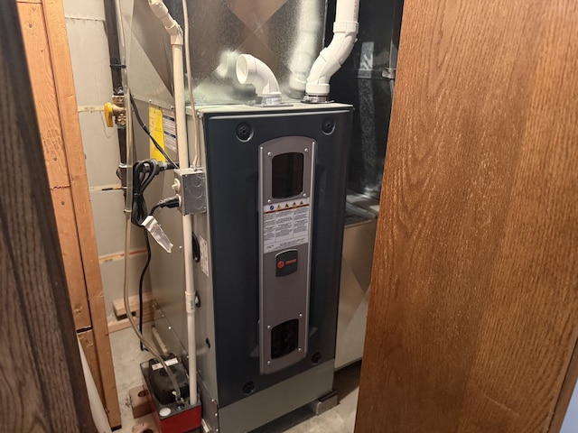 241 E Porter St, Oglesby, IL 61348 - utility room with heating unit