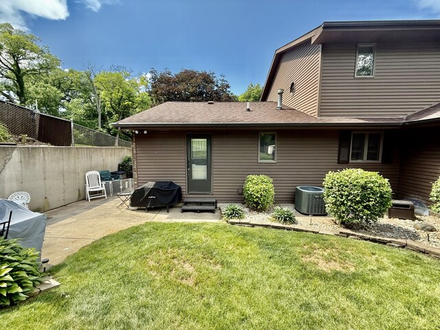 241 E Porter St, Oglesby, IL 61348 - back of house featuring a patio and entry steps