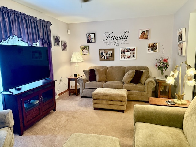 241 E Porter St, Oglesby, IL 61348 - living area featuring light colored carpet and baseboards