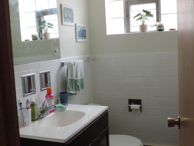 5063 N Menard Ave, Chicago, IL 60630 - bathroom with tile walls, healthy amount of natural light, and vanity
