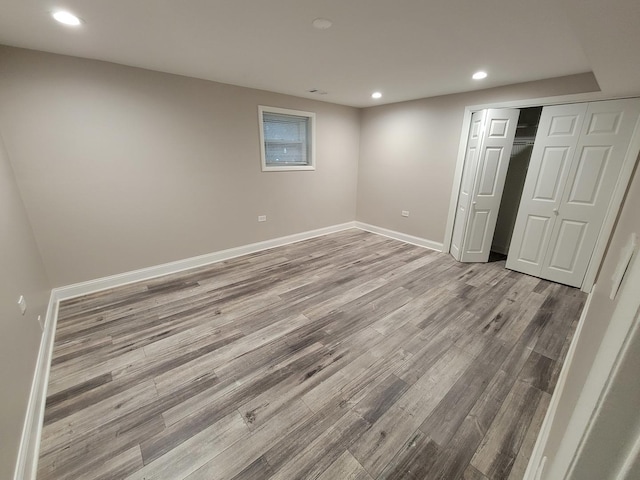 5063 N Menard Ave, Chicago, IL 60630 - finished below grade area with recessed lighting and wood finished floors
