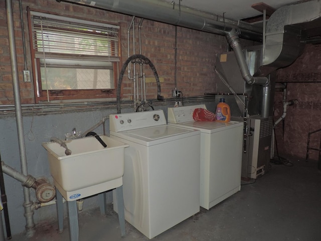 5063 N Menard Ave, Chicago, IL 60630 - laundry room with separate washer and dryer and heating unit