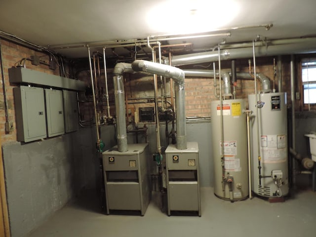 5063 N Menard Ave, Chicago, IL 60630 - utility room with gas water heater and a heating unit