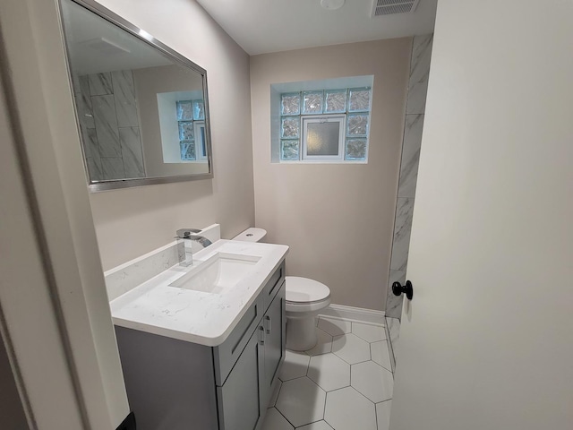 5063 N Menard Ave, Chicago, IL 60630 - bathroom featuring vanity and tile patterned floors