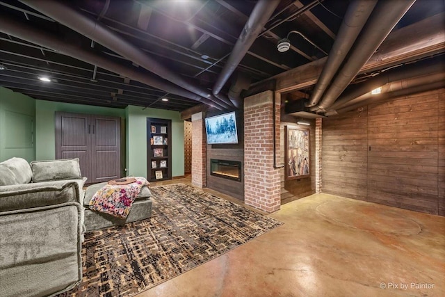 558 W Downer Pl, Aurora, IL 60506 - basement with a fireplace and wood walls