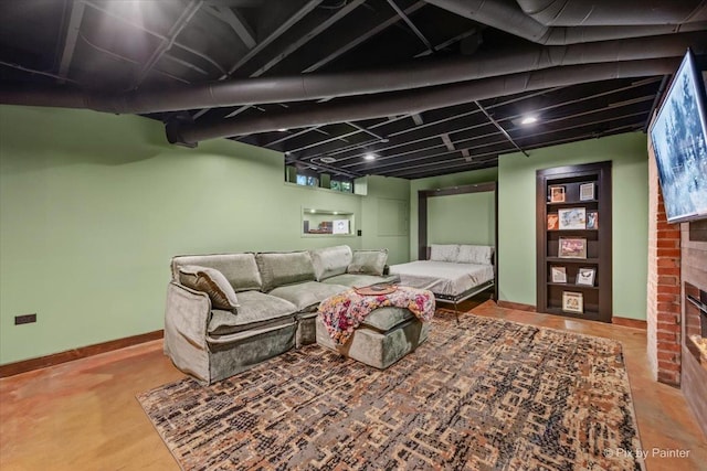 558 W Downer Pl, Aurora, IL 60506 - living area featuring baseboards and a brick fireplace