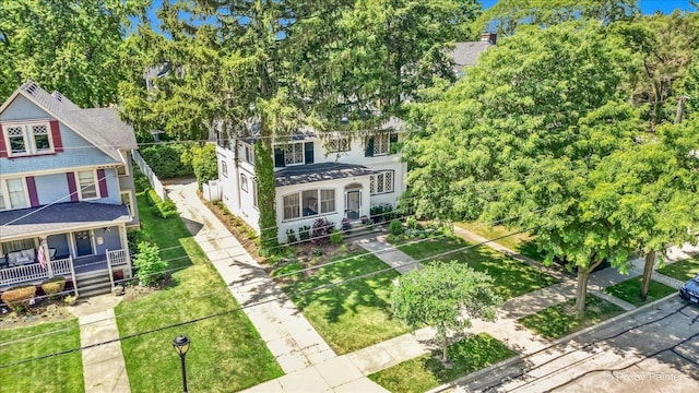 558 W Downer Pl, Aurora, IL 60506 - aerial view of property and surrounding area with a tree filled landscape