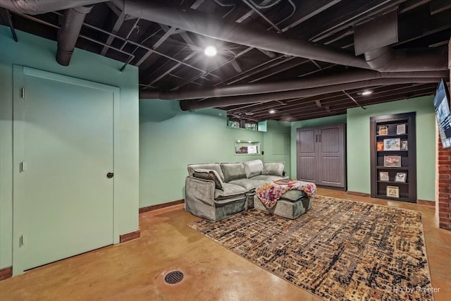 558 W Downer Pl, Aurora, IL 60506 - living room with concrete floors and baseboards