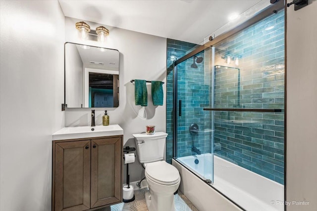 558 W Downer Pl, Aurora, IL 60506 - full bath featuring vanity, shower / bath combination with glass door, and tile patterned floors