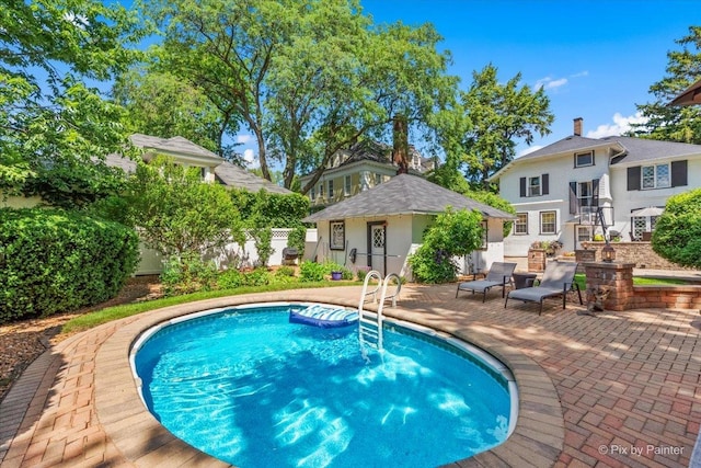 558 W Downer Pl, Aurora, IL 60506 - view of pool with a patio area