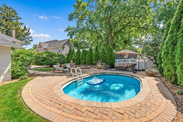 558 W Downer Pl, Aurora, IL 60506 - view of swimming pool featuring a patio area and outdoor lounge area