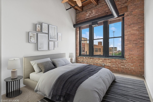 331 S Peoria St Unit Ph6, Chicago, IL 60607 - bedroom with brick wall, a high ceiling, and carpet floors