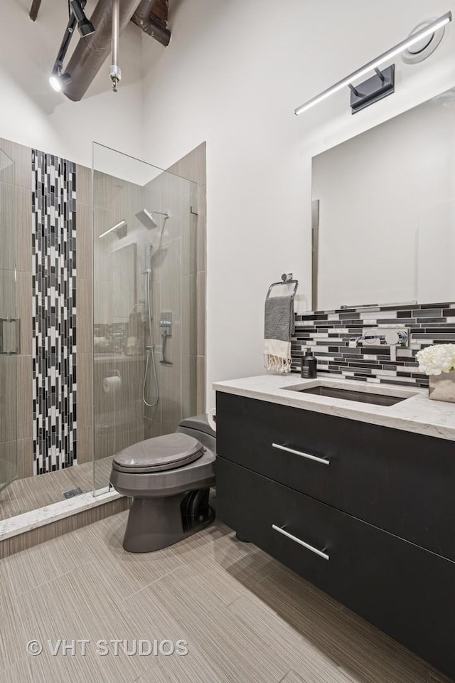 331 S Peoria St Unit Ph6, Chicago, IL 60607 - full bath with vanity, a shower stall, and decorative backsplash