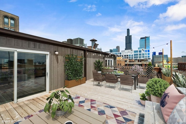 331 S Peoria St Unit Ph6, Chicago, IL 60607 - wooden terrace with an outdoor hangout area and a city view