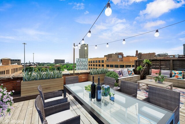331 S Peoria St Unit Ph6, Chicago, IL 60607 - wooden deck with an outdoor hangout area and outdoor dining space