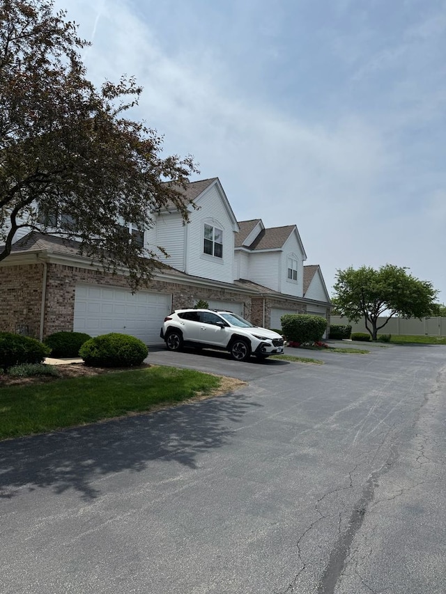 352 Bay Dr, Itasca, IL 60143 - view of side of home featuring a garage and driveway