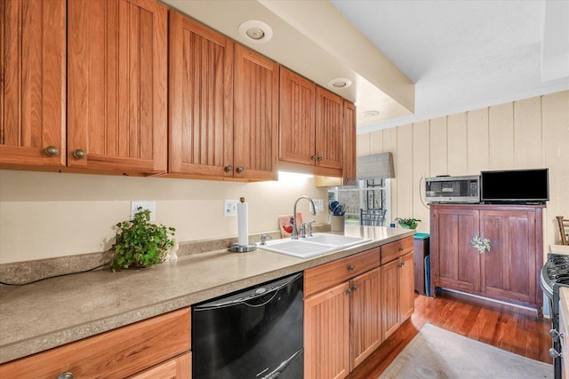 13809 Pine Rd, Dewitt, IL 61735 - kitchen featuring appliances with stainless steel finishes, wood finished floors, and light countertops