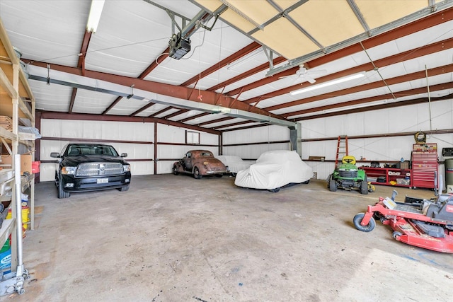 13809 Pine Rd, Dewitt, IL 61735 - garage featuring a garage door opener