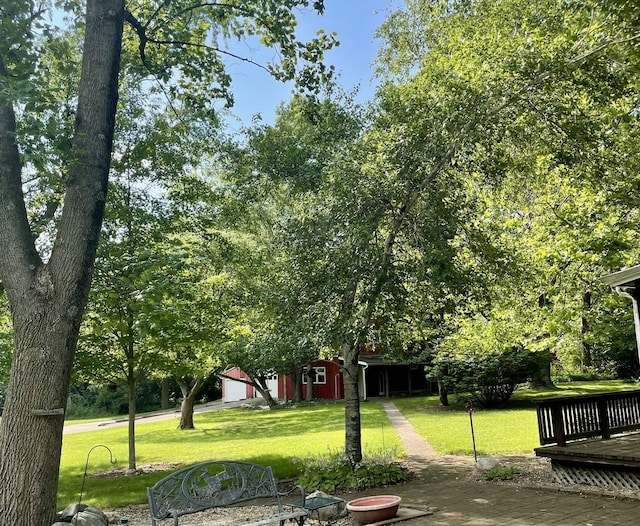 13809 Pine Rd, Dewitt, IL 61735 - view of green lawn featuring an outdoor structure and a deck