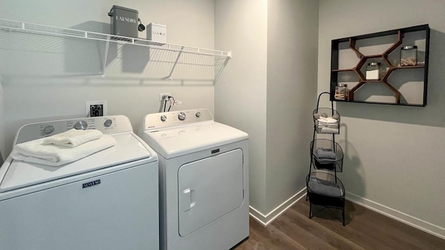 1038 Emerald Dr, Montgomery, IL 60538 - laundry area with dark wood-style floors and independent washer and dryer