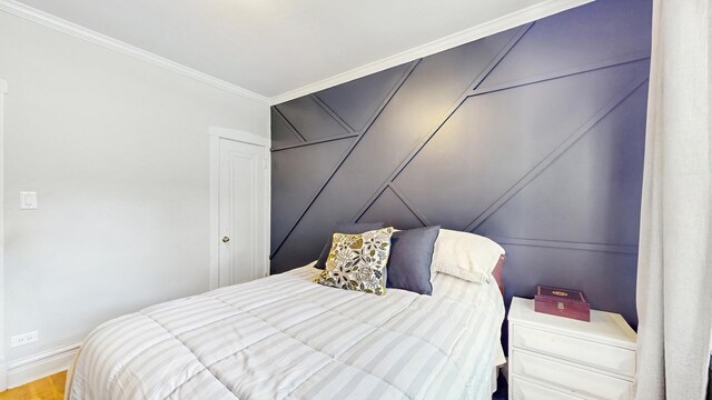 3253 W Leland Ave Unit 2, Chicago, IL 60625 - bedroom with crown molding and wood finished floors