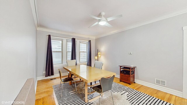 3253 W Leland Ave Unit 2, Chicago, IL 60625 - dining area with crown molding, ceiling fan, and light wood finished floors