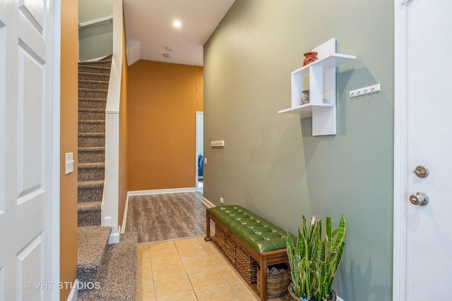 108 Belvidere Ave, Forest Park, IL 60130 - hallway featuring stairs, light tile patterned floors, and recessed lighting