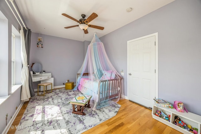 108 Belvidere Ave, Forest Park, IL 60130 - bedroom with wood finished floors and ceiling fan