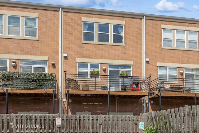 108 Belvidere Ave, Forest Park, IL 60130 - rear view of property with a balcony and brick siding