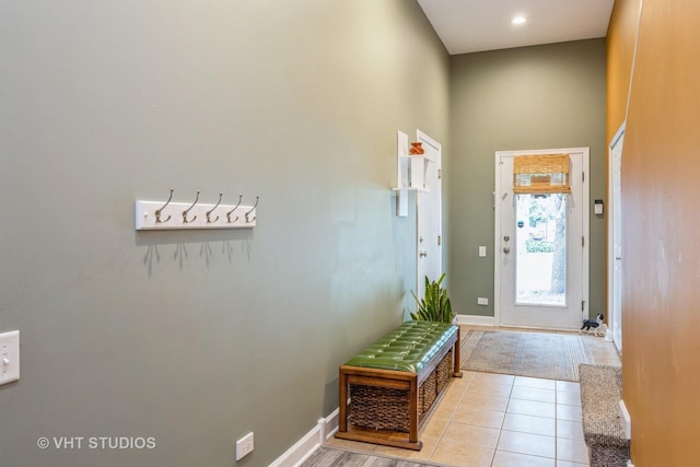 108 Belvidere Ave, Forest Park, IL 60130 - doorway to outside with tile patterned flooring, a high ceiling, and recessed lighting