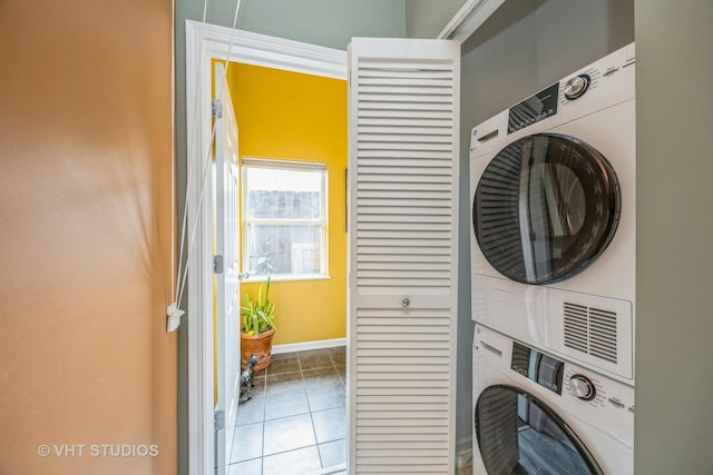 108 Belvidere Ave, Forest Park, IL 60130 - laundry room featuring estacked washer and dryer and tile patterned floors