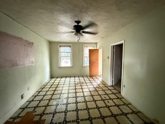 4904 W 31st St, Cicero, IL 60804 - spare room featuring ceiling fan and tile patterned floors