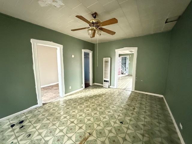 4904 W 31st St, Cicero, IL 60804 - unfurnished bedroom with a heating unit and ceiling fan