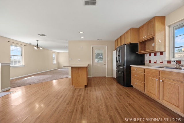 7334 Maridon Rd, Countryside, IL 60525 - kitchen featuring light wood-style flooring, open floor plan, a chandelier, healthy amount of natural light, and recessed lighting